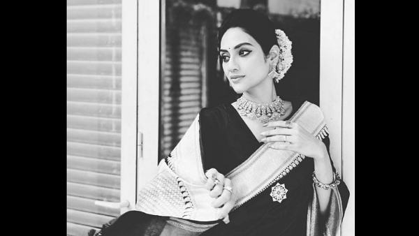 actress-nusrat-jahan-traditional-look-in-banarasi-sari-heavy-jewellery-gajre-read-the-details actress-nusrat-jahan-traditional-look-in-banarasi-sari-heavy-jewellery-gajre-read-the-details